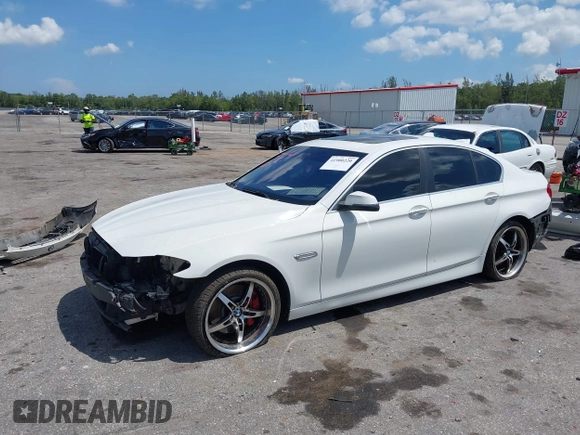 2014 BMW 5 Series 535i xDrive with VIN WBA5B3C56ED536747, listed as a IAAI auction lot 41900220 with 132,757 mi miles and . Bid and sale history available at carsss.com. Image 18.