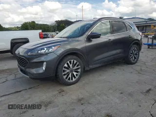 2020 Ford Escape Titanium z VIN 1FMCU9J92LUA23310, wystawiony jako Copart lot #58844495 z przebiegiem 86 611 mil mil oraz Tytuł czysty. Historia ofert i sprzedaży dostępna na DreamBid. Obrazek 1.