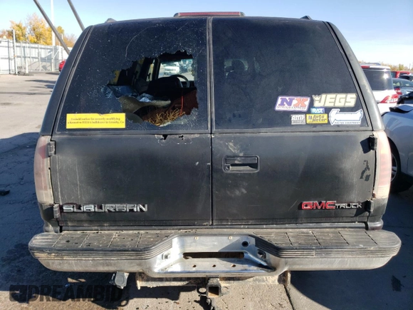1997 GMC Suburban z VIN 3GKFK16R3VG511306, wystawiony jako Copart lot #78504814 z przebiegiem 287 079 mil mil oraz Szkoda całkowita • Salvage title. Historia ofert i sprzedaży dostępna na DreamBid. Obrazek 6.