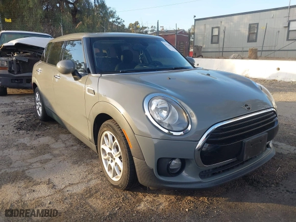 2019 MINI Clubman Cooper with VIN WMWLN5C59K2G82399, listed as a IAAI auction lot 41349514 with 64,235 mi miles. Bid and sale history available at carsss.com. Image 1.
