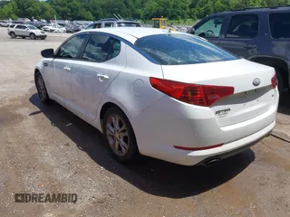 2013 Kia Optima LX z VIN 5XXGM4A7XDG197818, wystawiony jako IAAI lot #42340379 z przebiegiem 185 144 mil mil oraz . Historia ofert i sprzedaży dostępna na DreamBid. Obrazek 3.