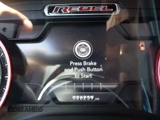 2022 Ram 1500 Rebel z VIN 1C6SRFLT4NN177112, wystawiony jako IAAI lot #42402050 z przebiegiem 26 239 mil mil oraz . Historia ofert i sprzedaży dostępna na DreamBid. Obrazek 15.
