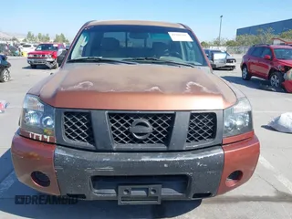 2004 Nissan Titan LE z VIN 1N6AA07A84N514538, wystawiony jako IAAI lot #42396385 z przebiegiem 214 783 mil mil oraz . Historia ofert i sprzedaży dostępna na DreamBid. Obrazek 12.