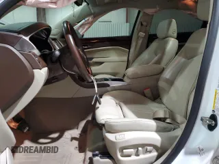 2016 Cadillac SRX Performance Collection with VIN 3GYFNCE36GS525836, listed as a Copart auction lot 84502634 with 94,639 mi miles and Salvage title. Bid and sale history available at DreamBid. Image 7.