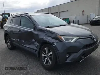 2016 Toyota RAV4 XLE with VIN 2T3RFREV6GW451194, listed as a Copart auction lot 59293325 with 168,739 mi miles and Salvage title. Bid and sale history available at DreamBid. Image 14.