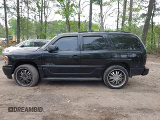 2005 GMC Yukon Denali z VIN 1GKEK63U65J182925, wystawiony jako IAAI lot #42071053 z przebiegiem 235 367 mil mil oraz . Historia ofert i sprzedaży dostępna na DreamBid. Obrazek 14.