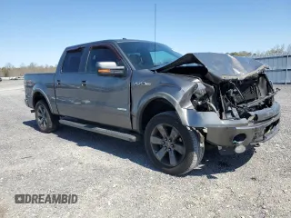2011 Ford F-150 XLT with VIN 1FTFW1ET5BFC70472, listed as a Copart auction lot 51338825 with 151,719 mi miles and Salvage Title. Bid and sale history available at carsss.com. Image 4.