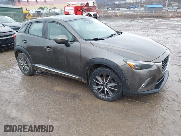 2016 Mazda CX-3 Grand Touring with VIN JM1DKBD77G0107328, listed as a IAAI auction lot 41682949 with 156,935 mi miles. Bid and sale history available at carsss.com. Image 1.
