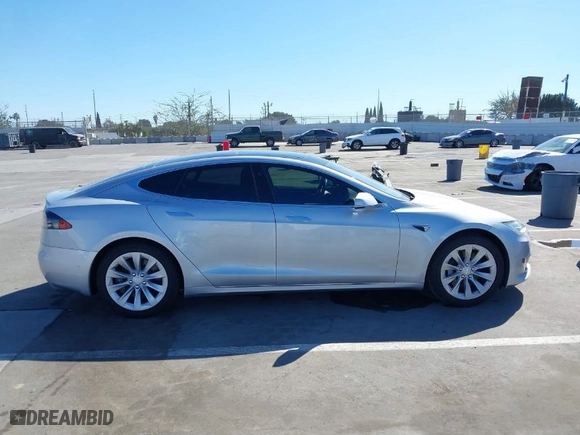 2016 Tesla Model S 70 kWh Battery with VIN 5YJSA1E17GF171143, listed as a IAAI auction lot 41707192 with NaN miles. Bid and sale history available at carsss.com. Image 12.