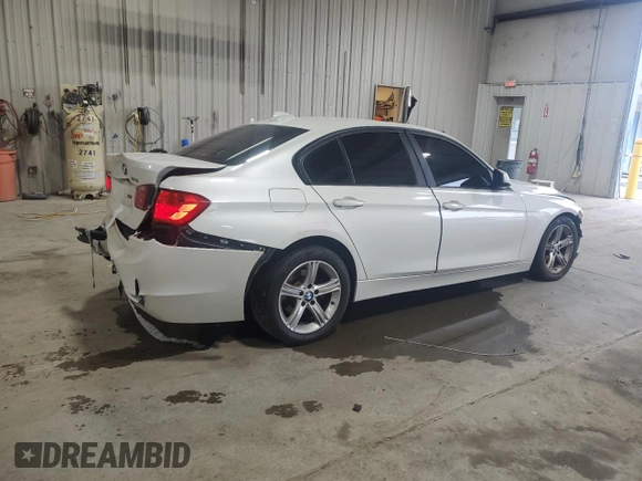 2013 BMW 3 Series 328i xDrive with VIN WBA3B3C54DF536837, listed as a Copart auction lot 62305215 with 289,839 mi miles and Salvage title. Bid and sale history available at DreamBid. Image 3.