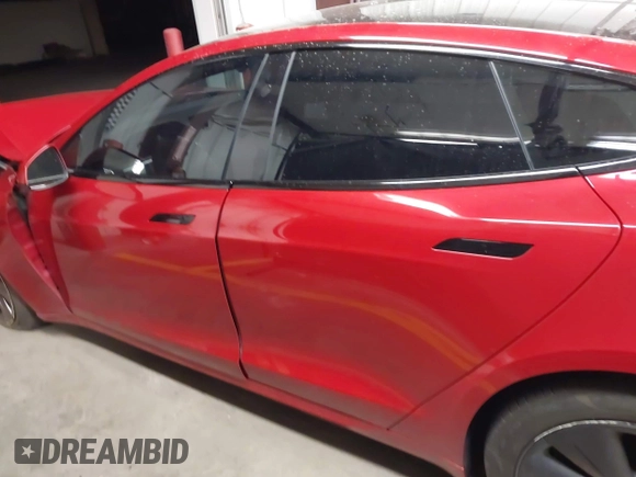 2022 Tesla Model S Plaid z VIN 5YJSA1E61NF471785, wystawiony jako IAAI lot #42208101 z przebiegiem Nie podano mil oraz . Historia ofert i sprzedaży dostępna na DreamBid. Obrazek 14.