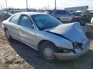 1996 Mercury Sable GS with VIN 1MELM50U5TA633365, listed as a IAAI auction lot 41723519 with 144,067 mi miles. Bid and sale history available at carsss.com. Image 1.