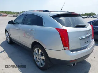 2011 Cadillac SRX Premium Collection with VIN 3GYFNCEY2BS594415, listed as a IAAI auction lot 42042854 with 130,894 mi miles and . Bid and sale history available at DreamBid. Image 3.