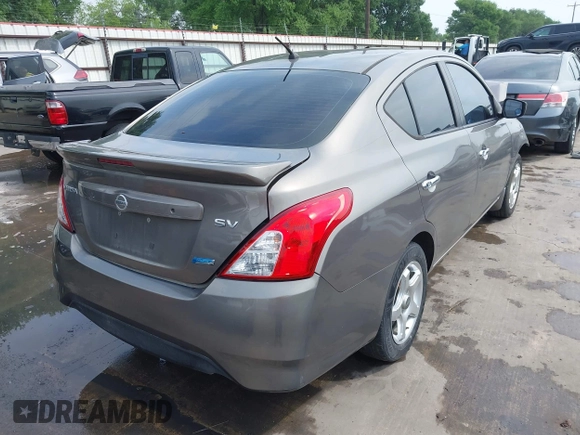 2015 Nissan Versa SV with VIN 3N1CN7APXFL830101, listed as a IAAI auction lot 41952806 with 144,354 mi miles. Bid and sale history available at carsss.com. Image 4.