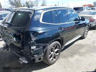2021 BMW X3 sDrive30i with VIN 5UXTY3C07M9G14775, listed as a IAAI auction lot 41765728 with 54,612 mi miles. Bid and sale history available at carsss.com. Image 4.