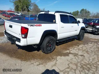 2018 Toyota Tacoma SR with VIN 5TFCZ5AN4JX164600, listed as a IAAI auction lot 41646488 with 87,349 mi miles. Bid and sale history available at carsss.com. Image 4.
