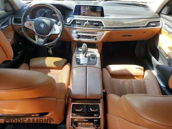 2016 BMW 7 Series 740i z VIN WBA7E2C58GG738940, wystawiony jako Copart lot #60503595 z przebiegiem 99 654 mil mil oraz Szkoda całkowita • Salvage title. Historia ofert i sprzedaży dostępna na DreamBid. Obrazek 8.
