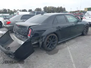 2015 Chrysler 300 S z VIN 2C3CCABG5FH766299, wystawiony jako IAAI lot #42252742 z przebiegiem 146 255 mil mil oraz . Historia ofert i sprzedaży dostępna na DreamBid. Obrazek 4.