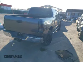 2012 Toyota Tundra 4WD Truck with VIN 5TFDW5F10CX259337, listed as a IAAI auction lot 41854421 with 168,577 mi miles. Bid and sale history available at carsss.com. Image 4.