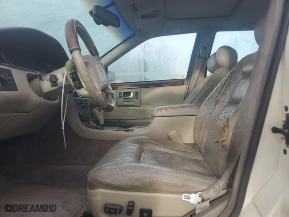 1997 Cadillac Seville Touring STS with VIN 1G6KY5292VU818343, listed as a Copart auction lot 86368564 with 0 mi miles and Non Repairable. Bid and sale history available at carsss.com. Image 7.