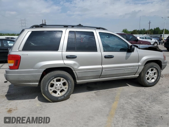 2000 Jeep Grand Cherokee Laredo with VIN 1J4GW48N1YC324356, listed as a Copart auction lot 62011305 with 242,322 mi miles and Salvage title. Bid and sale history available at DreamBid. Image 3.