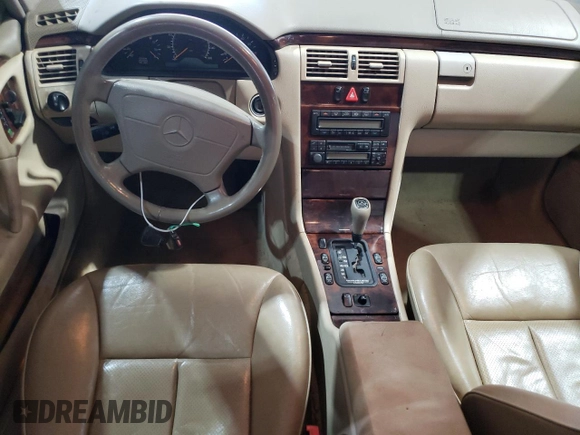 1998 Mercedes-Benz E-Class with VIN WDBJF65FXWA648112, listed as a Copart auction lot 47074665 with 0 mi miles and Salvage Title. Bid and sale history available at carsss.com. Image 8.