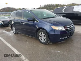 2014 Honda Odyssey EX-L with VIN 5FNRL5H68EB049914, listed as a IAAI auction lot 41986894 with 125,222 mi miles and . Bid and sale history available at carsss.com. Image 1.