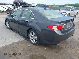 2012 Acura TSX with VIN JH4CU2F45CC016817, listed as a IAAI auction lot 42104700 with 148,617 mi miles. Bid and sale history available at carsss.com. Image 3.