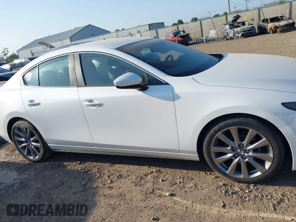 2020 Mazda 3 Select with VIN 3MZBPACL8LM135483, listed as a IAAI auction lot 42568802 with 40,466 mi miles and . Bid and sale history available at DreamBid. Image 14.