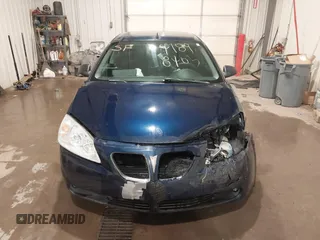 2009 Pontiac G6 GT 1SA z VIN 1G2ZH57NX94121112, wystawiony jako IAAI lot #41898403 z przebiegiem 155 100 mil mil oraz . Historia ofert i sprzedaży dostępna na DreamBid. Obrazek 13.