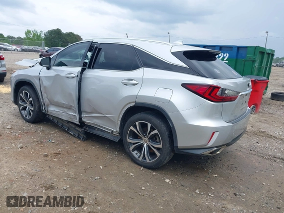 2016 Lexus RX 350 z VIN 2T2ZZMCA5GC002315, wystawiony jako IAAI lot #42107312 z przebiegiem 156 339 mil mil oraz . Historia ofert i sprzedaży dostępna na DreamBid. Obrazek 3.