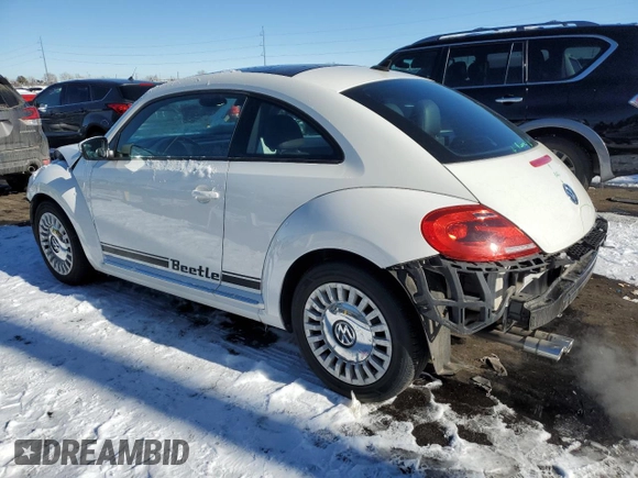 2013 Volkswagen Beetle 2.5L with VIN 3VWJP7AT9DM687870, listed as a Copart auction lot 87934875 with 91,557 mi miles and Salvage Title. Bid and sale history available at DreamBid. Image 2.
