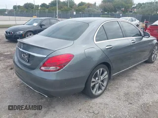 2017 Mercedes-Benz C 300 with VIN 55SWF4JB9HU205974, listed as a IAAI auction lot 42005543 with Not provided miles and . Bid and sale history available at DreamBid. Image 4.