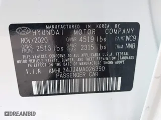2021 Hyundai Sonata Hybrid SEL with VIN KMHL34JJ4MA026390, listed as a IAAI auction lot 41136913 with 32,439 mi miles. Bid and sale history available at carsss.com. Image 9.