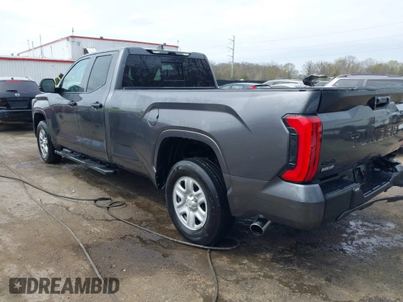 2023 Toyota Tundra with VIN 5TFKB5GDXPX002218, listed as a IAAI auction lot 41932719 with 71,335 mi miles and . Bid and sale history available at DreamBid. Image 3.