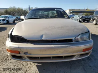 1994 Toyota Camry XLE with VIN JT2GK13E0R0017831, listed as a Copart auction lot 49887485 with 143,303 mi miles and Salvage Title. Bid and sale history available at carsss.com. Image 5.