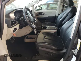 2023 Chrysler Pacifica Touring L with VIN 2C4RC1BG1PR581376, listed as a Copart auction lot 59901915 with 57,411 mi miles and Salvage title. Bid and sale history available at DreamBid. Image 7.