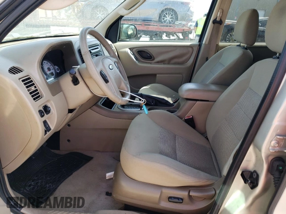 2005 Ford Escape XLT with VIN 1FMYU93105KC50944, listed as a Copart auction lot 50500965 with 133,532 mi miles and Salvage Title. Bid and sale history available at DreamBid. Image 7.
