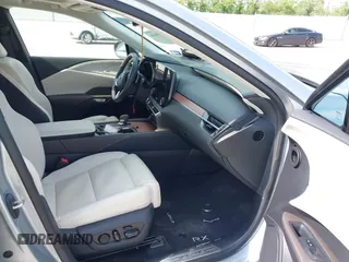 2023 Lexus RX 350h with VIN 2T2BBMCA8PC022516, listed as a IAAI auction lot 42105640 with 15,965 mi miles and . Bid and sale history available at DreamBid. Image 5.