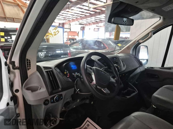 2016 Ford Transit Cargo with VIN 1FTYE1ZM1GKA06047, listed as a IAAI auction lot 42679265 with 124,601 mi miles and . Bid and sale history available at DreamBid. Image 16.