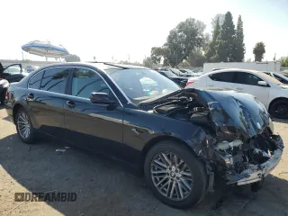 2003 BMW 7 Series 745Li with VIN WBAGN63413DR12213, listed as a Copart auction lot 72643284 with 186,506 mi miles and Salvage Title. Bid and sale history available at carsss.com. Image 4.