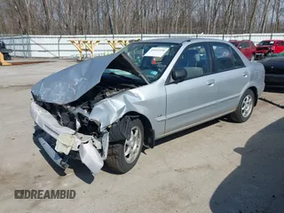 2000 Mazda Protege DX with VIN JM1BJ2227Y0240819, listed as a IAAI auction lot 41810228 with 68,650 mi miles and . Bid and sale history available at DreamBid. Image 17.