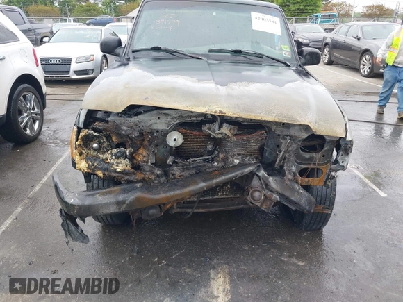 2004 Ford Ranger XL with VIN 1FTYR14U74PB60014, listed as a IAAI auction lot 42003581 with Not Provided miles and . Bid and sale history available at carsss.com. Image 6.