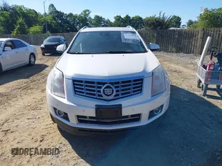 2013 Cadillac SRX Performance Collection with VIN 3GYFNHE31DS597987, listed as a IAAI auction lot 42319058 with 139,670 mi miles and . Bid and sale history available at DreamBid. Image 12.