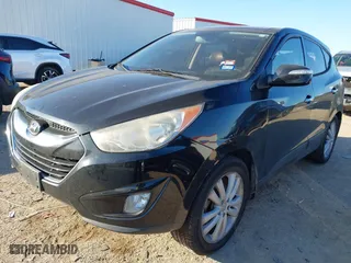 2013 Hyundai Tucson GLS with VIN KM8JU3AC4DU616121, listed as a IAAI auction lot 41284719 with 154,406 mi miles. Bid and sale history available at carsss.com. Image 16.