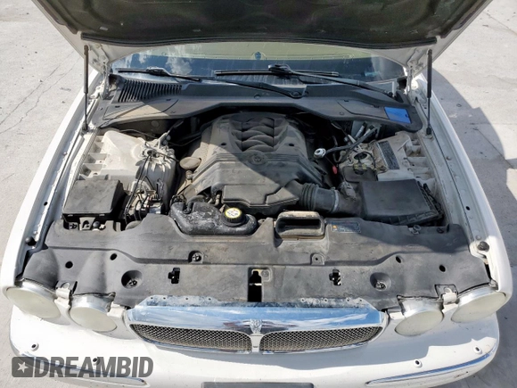2006 Jaguar XJ Vanden Plas with VIN SAJWA82B16SH06996, listed as a Copart auction lot 62509025 with 80,236 mi miles and Salvage title. Bid and sale history available at DreamBid. Image 11.