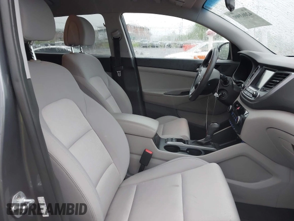 2018 Hyundai Tucson SEL with VIN KM8J3CA4XJU640429, listed as a IAAI auction lot 42063900 with 124,844 mi miles. Bid and sale history available at carsss.com. Image 5.