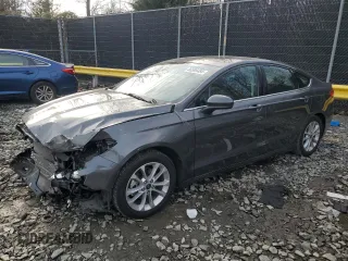 2020 Ford Fusion SE z VIN 3FA6P0LU7LR104788, wystawiony jako Copart lot #86595484 z przebiegiem 29 878 mil mil oraz Szkody całkowita. Historia ofert i sprzedaży dostępna na DreamBid. Obrazek 1.