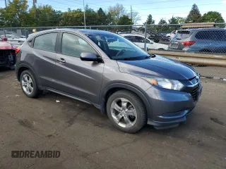 2018 Honda HR-V LX with VIN 3CZRU6H38JG703401, listed as a Copart auction lot 70567114 with 106,672 mi miles and Salvage Title. Bid and sale history available at carsss.com. Image 4.