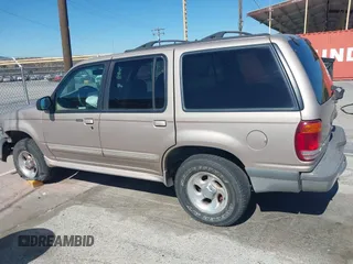 1998 Ford Explorer XL z VIN 1FMZU34E4WZB50132, wystawiony jako IAAI lot #42708532 z przebiegiem 237 486 mil mil oraz . Historia ofert i sprzedaży dostępna na DreamBid. Obrazek 14.